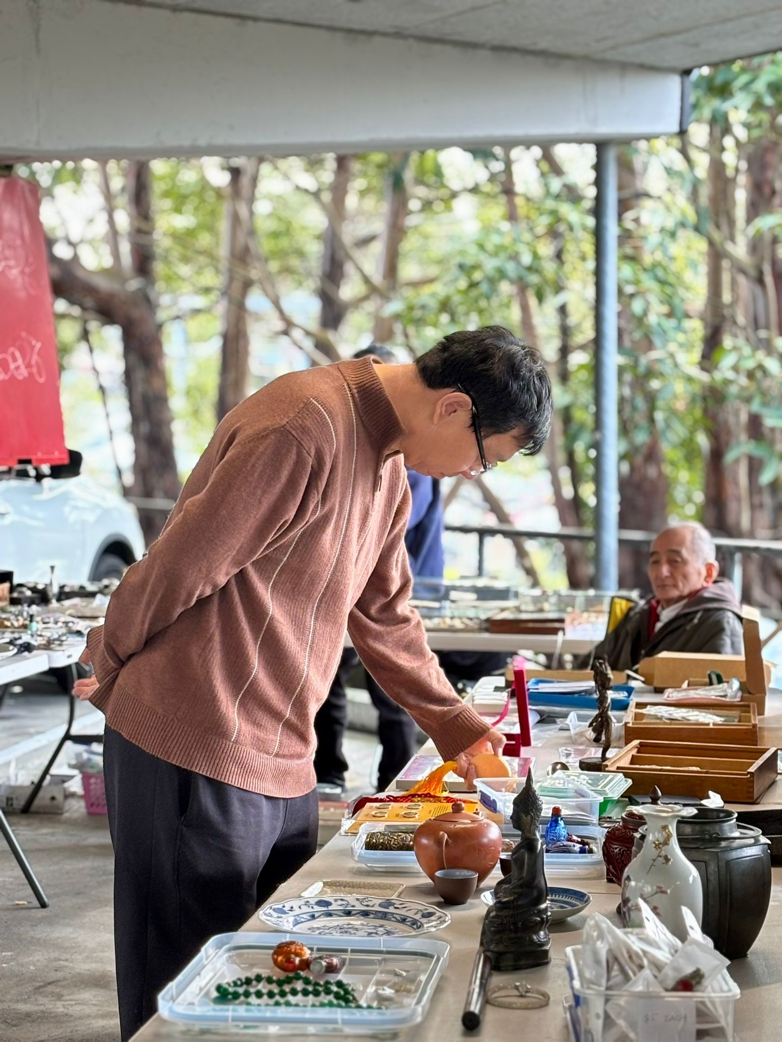 Man browsing a stall.